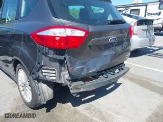 2016 Ford C-Max Hybrid SE with VIN 1FADP5AU0GL100125, listed as a IAAI auction lot 42057099 with 175,993 mi miles. Bid and sale history available at carsss.com. Image 6.