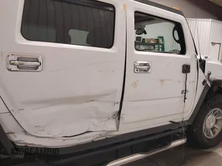 2006 Hummer H2 with VIN 5GRGN23U06H121985, listed as a IAAI auction lot 41336620 with 171,647 mi miles. Bid and sale history available at carsss.com. Image 6.