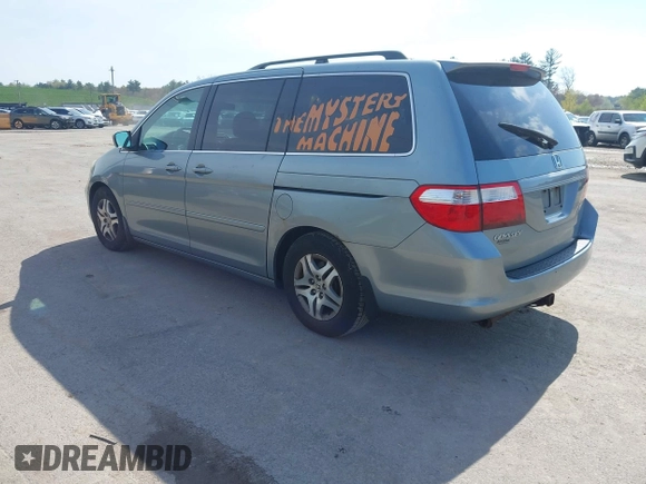 2006 Honda Odyssey EX-L with VIN 5FNRL38656B120539, listed as a IAAI auction lot 42190857 with 242,152 mi miles. Bid and sale history available at carsss.com. Image 3.