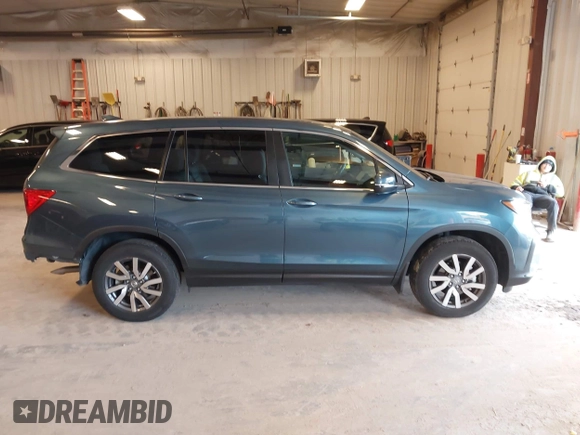 2021 Honda Pilot EX-L z VIN 5FNYF6H54MB082455, wystawiony jako IAAI lot #42343787 z przebiegiem 25 954 mil mil oraz . Historia ofert i sprzedaży dostępna na DreamBid. Obrazek 13.