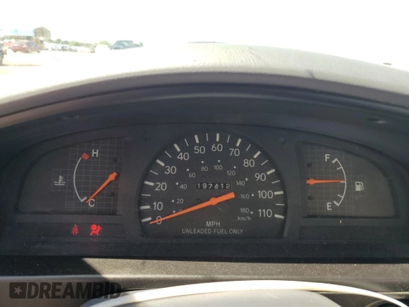 1999 Toyota Tacoma z VIN 4TANL42N5XZ453478, wystawiony jako Copart lot #56711635 z przebiegiem 197 412 mil mil oraz Szkoda całkowita • Salvage title. Historia ofert i sprzedaży dostępna na DreamBid. Obrazek 9.