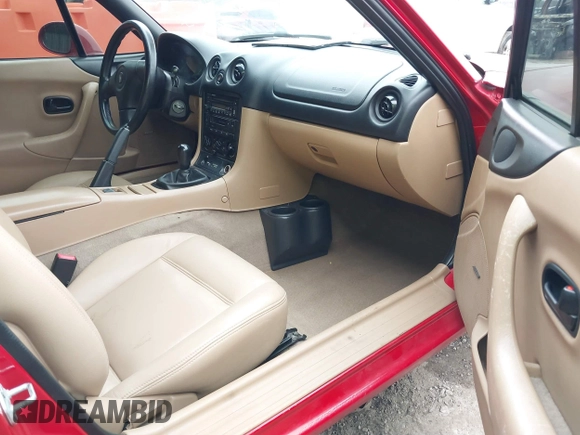 1999 Mazda MX-5 Miata with VIN JM1NB3531X0120856, listed as a IAAI auction lot 41531407 with 92,512 mi miles and . Bid and sale history available at DreamBid. Image 5.