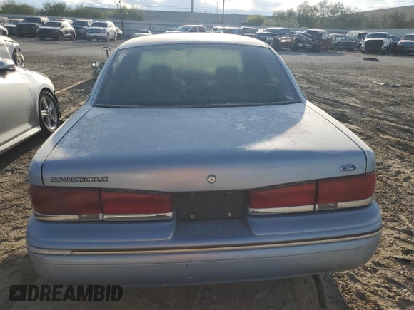1997 Ford Crown Victoria LX z VIN 2FALP74W1VX206832, wystawiony jako Copart lot #51716425 z przebiegiem 325 063 mil mil oraz Szkoda całkowita • Salvage title. Historia ofert i sprzedaży dostępna na DreamBid. Obrazek 6.
