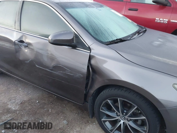 2015 Toyota Camry XLE with VIN 4T1BF1FK1FU895551, listed as a IAAI auction lot 40253286 with 221,273 mi miles and . Bid and sale history available at DreamBid. Image 6.
