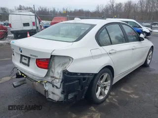 2014 BMW 3 Series 328i xDrive with VIN WBA3B5C55EP543478, listed as a IAAI auction lot 41629266 with 150,595 mi miles and . Bid and sale history available at DreamBid. Image 4.