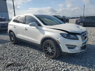 2019 Lincoln MKC Select with VIN 5LMCJ2C90KUL20777, listed as a Copart auction lot 51981415 with 52,871 mi miles and Salvage title. Bid and sale history available at DreamBid. Image 4.