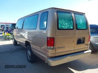 1998 Ford Econoline Wagon XL z VIN 1FBSS31L5WHB69202, wystawiony jako IAAI lot #41666477 z przebiegiem Nie podano mil oraz . Historia ofert i sprzedaży dostępna na DreamBid. Obrazek 3.