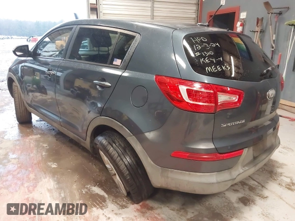 2013 Kia Sportage LX with VIN KNDPB3A2XD7446504, listed as a IAAI auction lot 41271313 with 94,646 mi miles and . Bid and sale history available at DreamBid. Image 3.