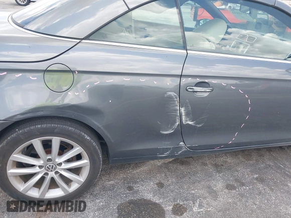 2014 Volkswagen Eos Sport with VIN WVWBW8AH2EV000313, listed as a IAAI auction lot 42333112 with 106,125 mi miles and . Bid and sale history available at DreamBid. Image 18.