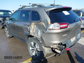 2017 Jeep Cherokee Trailhawk L Plus with VIN 1C4PJMBB6HW654172, listed as a IAAI auction lot 41851236 with 104,263 mi miles. Bid and sale history available at carsss.com. Image 3.