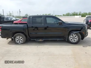 2022 Nissan Frontier SV with VIN 1N6ED1EJ2NN677012, listed as a IAAI auction lot 41967201 with 76,835 mi miles and . Bid and sale history available at DreamBid. Image 13.