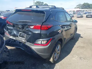 2023 Hyundai Kona SEL with VIN KM8K62ABXPU040491, listed as a IAAI auction lot 42166633 with 34,771 mi miles and . Bid and sale history available at DreamBid. Image 4.