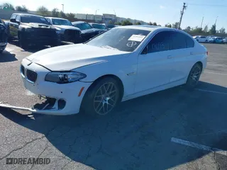 2014 BMW 5 Series 528i with VIN WBA5A5C55ED509201, listed as a IAAI auction lot 41101093 with 1 mi miles. Bid and sale history available at carsss.com. Image 2.