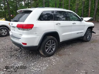 2018 Jeep Grand Cherokee Limited z VIN 1C4RJEBG1JC288705, wystawiony jako IAAI lot #42254117 z przebiegiem 117 479 mil mil oraz . Historia ofert i sprzedaży dostępna na DreamBid. Obrazek 4.