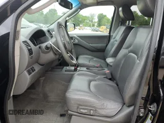 2011 Nissan Frontier Pro-4X with VIN 1N6AD0EVXBC433028, listed as a Copart auction lot 57653305 with 144,753 mi miles and Salvage title. Bid and sale history available at DreamBid. Image 7.