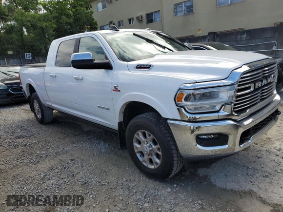2020 Ram 2500 Laramie with VIN 3C6UR5NL8LG313893, listed as a Copart auction lot 42675764 with 128,135 mi miles and Salvage Title. Bid and sale history available at carsss.com. Image 4.