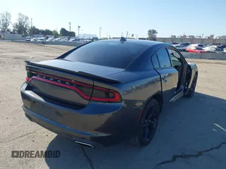 2016 Dodge Charger SXT with VIN 2C3CDXHG6GH327461, listed as a IAAI auction lot 41955412 with 124,775 mi miles and . Bid and sale history available at carsss.com. Image 4.