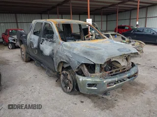 2014 Ram 2500 with VIN 3C6TR5MT7EG125012, listed as a IAAI auction lot 41501509 with Not provided miles and . Bid and sale history available at DreamBid. Image 1.