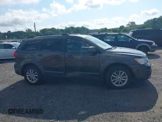 2017 Dodge Journey SXT z VIN 3C4PDDBG3HT540624, wystawiony jako IAAI lot #42719281 z przebiegiem 56 999 mil mil oraz . Historia ofert i sprzedaży dostępna na DreamBid. Obrazek 13.