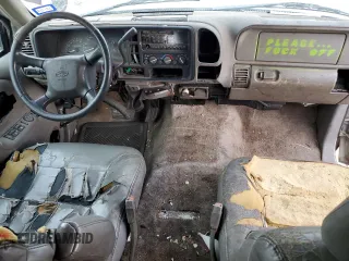 1999 Chevrolet Suburban with VIN 1GNEC16R7XJ418169, listed as a Copart auction lot 88995495 with 2,015,240 mi miles and Salvage title. Bid and sale history available at DreamBid. Image 8.