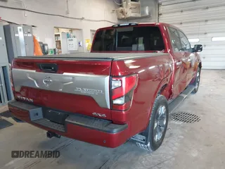 2021 Nissan Titan Pro-4X with VIN 1N6AA1ED9MN525986, listed as a IAAI auction lot 41795296 with 34,395 mi miles and . Bid and sale history available at DreamBid. Image 4.