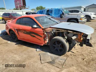 2004 Ford Mustang Standard with VIN 1FAFP40644F208795, listed as a Copart auction lot 62378165 with Not provided miles and Salvage title. Bid and sale history available at DreamBid. Image 4.