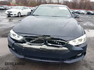 2016 BMW 4 Series 428i xDrive with VIN WBA4C9C59GG137067, listed as a IAAI auction lot 41913733 with 104,378 mi miles and . Bid and sale history available at carsss.com. Image 12.