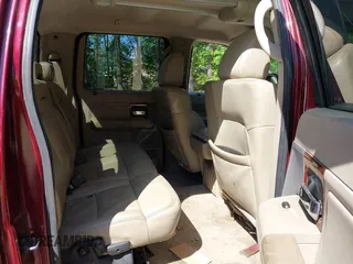 2006 Ford F-150 XLT with VIN 1FTPW14506FB81826, listed as a IAAI auction lot 42142287 with 136,768 mi miles. Bid and sale history available at carsss.com. Image 8.