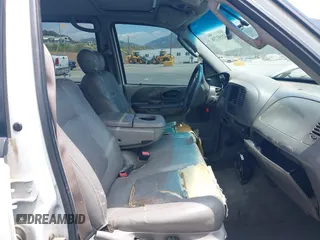 2002 Ford F-150 XLT with VIN 1FTRW07L32KD85390, listed as a IAAI auction lot 42193738 with Not Provided miles and . Bid and sale history available at DreamBid. Image 5.