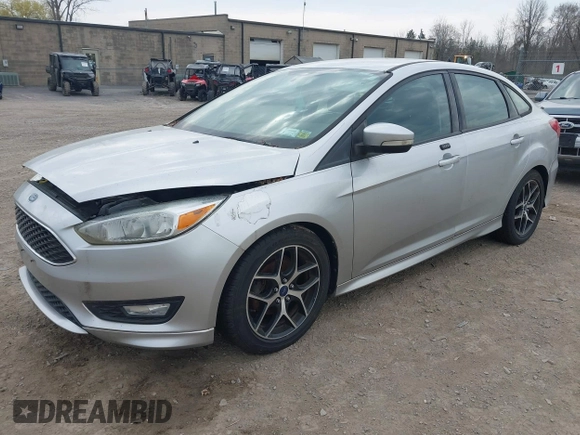 2016 Ford Focus SE with VIN 1FADP3F20GL228831, listed as a IAAI auction lot 42115033 with 106,975 mi miles. Bid and sale history available at carsss.com. Image 2.