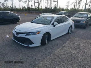 2019 Toyota Camry LE with VIN 4T1B11HK7KU806197, listed as a IAAI auction lot 41721148 with 83,373 mi miles and . Bid and sale history available at DreamBid. Image 17.