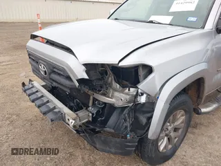 2017 Toyota Tacoma SR5 with VIN 5TFAZ5CN6HX030668, listed as a IAAI auction lot 41429982 with 92,565 mi miles and . Bid and sale history available at carsss.com. Image 6.