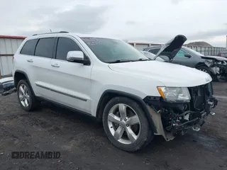 2013 Jeep Grand Cherokee Overland with VIN 1C4RJFCT4DC640553, listed as a IAAI auction lot 41311413 with 146,212 mi miles. Bid and sale history available at carsss.com. Image 1.