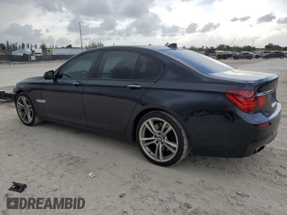 2013 BMW 7 Series 750i with VIN WBAYA8C56DC996704, listed as a Copart auction lot 64466705 with 102,278 mi miles and Salvage title. Bid and sale history available at DreamBid. Image 2.