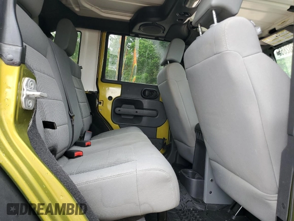 2008 Jeep Wrangler Rubicon z VIN 1J8GA69138L533859, wystawiony jako Copart lot #54202865 z przebiegiem 75 742 mil mil oraz Szkoda całkowita • Salvage title. Historia ofert i sprzedaży dostępna na DreamBid. Obrazek 11.