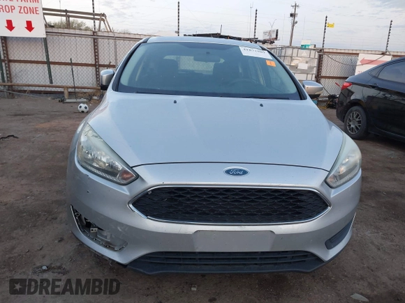 2015 Ford Focus SE with VIN 1FADP3K22FL282457, listed as a IAAI auction lot 41872989 with 98,590 mi miles. Bid and sale history available at carsss.com. Image 12.
