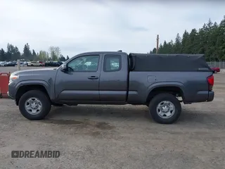 2018 Toyota Tacoma SR z VIN 5TFSX5EN0JX062612, wystawiony jako IAAI lot #41993211 z przebiegiem 92 586 mil mil oraz . Historia ofert i sprzedaży dostępna na DreamBid. Obrazek 14.