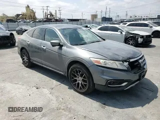 2013 Honda Crosstour EX-L z VIN 5J6TF1H59DL002040, wystawiony jako Copart lot #53917545 z przebiegiem 183 093 mil mil oraz Szkody całkowita. Historia ofert i sprzedaży dostępna na DreamBid. Obrazek 13.