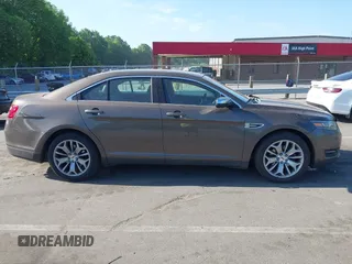 2016 Ford Taurus Limited z VIN 1FAHP2F81GG109548, wystawiony jako IAAI lot #42177871 z przebiegiem 168 611 mil mil oraz . Historia ofert i sprzedaży dostępna na DreamBid. Obrazek 13.