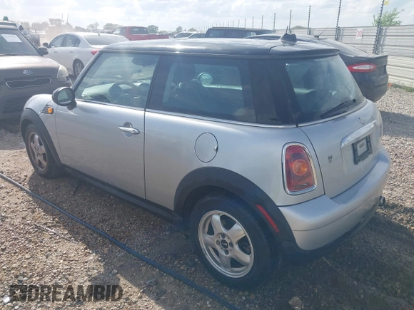 2008 MINI Hardtop with VIN WMWMF33578TU68033, listed as a IAAI auction lot 41939852 with 128,231 mi miles and . Bid and sale history available at DreamBid. Image 3.