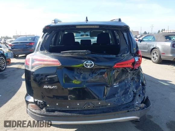 2016 Toyota RAV4 XLE with VIN 2T3RFREV6GW459313, listed as a IAAI auction lot 42074337 with 149,914 mi miles and . Bid and sale history available at DreamBid. Image 16.