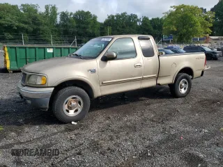 2000 Ford F-150 XL z VIN 1FTRX18W8YNC08160, wystawiony jako Copart lot #58671935 z przebiegiem 231 266 mil mil oraz Czysty tytuł • Clean title. Historia ofert i sprzedaży dostępna na DreamBid. Obrazek 1.