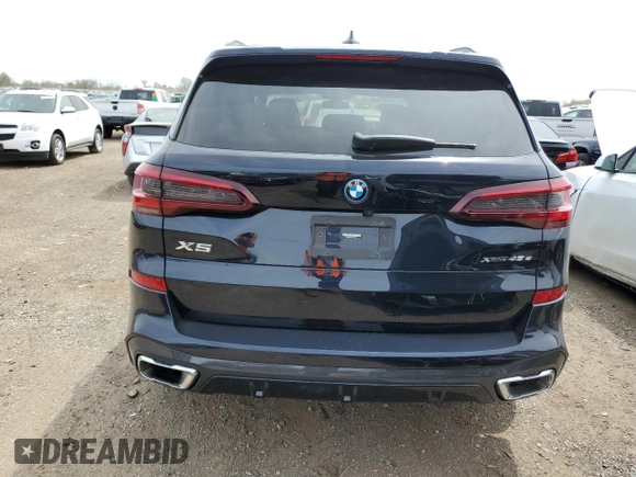 2023 BMW X5 xDrive45e with VIN 5UXTA6C04P9S03633, listed as a Copart auction lot 54916645 with Not provided miles and Salvage title. Bid and sale history available at DreamBid. Image 6.