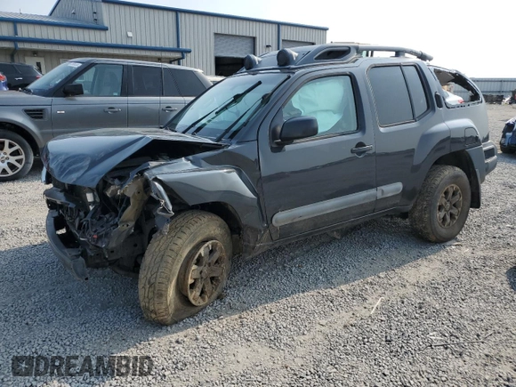 2015 Nissan Xterra Pro-4X z VIN 5N1AN0NWXFN664591, wystawiony jako Copart lot #60423525 z przebiegiem 246 477 mil mil oraz Szkoda całkowita • Salvage title. Historia ofert i sprzedaży dostępna na DreamBid. Obrazek 1.