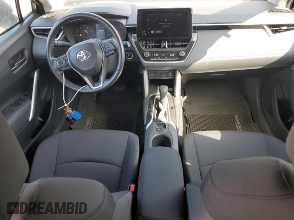 2023 Toyota Corolla Cross LE with VIN 7MUCAABG1PV050123, listed as a Copart auction lot 61384845 with 30,712 mi miles and Salvage title. Bid and sale history available at DreamBid. Image 8.