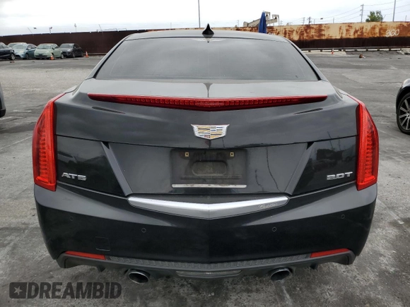2015 Cadillac ATS Luxury RWD z VIN 1G6AB5RX2F0131034, wystawiony jako Copart lot #54447025 z przebiegiem 120 412 mil mil oraz Szkoda całkowita • Salvage title. Historia ofert i sprzedaży dostępna na DreamBid. Obrazek 6.