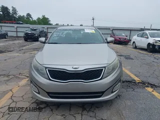 2015 Kia Optima SX with VIN 5XXGR4A73FG372494, listed as a IAAI auction lot 42345043 with 196,911 mi miles and . Bid and sale history available at DreamBid. Image 12.