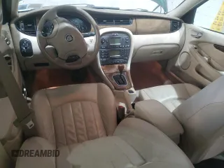 2003 Jaguar X-Type 2.5L Manual z VIN SAJEA51D63XD54591, wystawiony jako Copart lot #57638355 z przebiegiem Nie podano mil oraz Szkody całkowita. Historia ofert i sprzedaży dostępna na DreamBid. Obrazek 8.