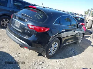 2016 Infiniti QX70 with VIN JN8CS1MW9GM752735, listed as a IAAI auction lot 41271197 with 165,269 mi miles and . Bid and sale history available at DreamBid. Image 4.