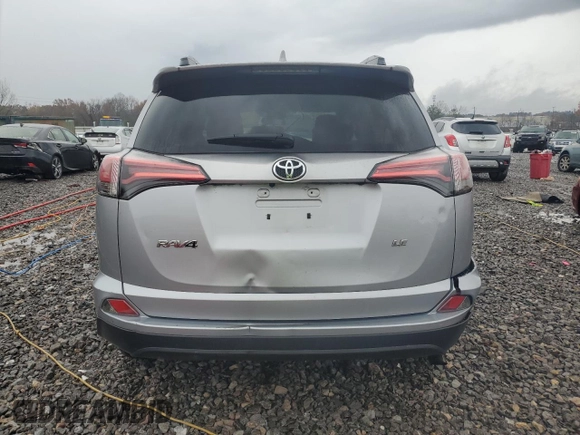 2017 Toyota RAV4 LE with VIN 2T3ZFREV4HW350558, listed as a Copart auction lot 83446744 with 87,244 mi miles and Salvage Title. Bid and sale history available at DreamBid. Image 6.